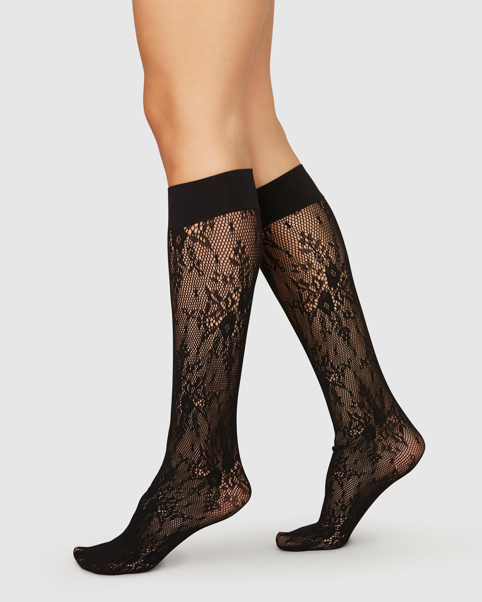 Swedish Stockings Rosa Lace knee-highs in black – Available at PERSEI