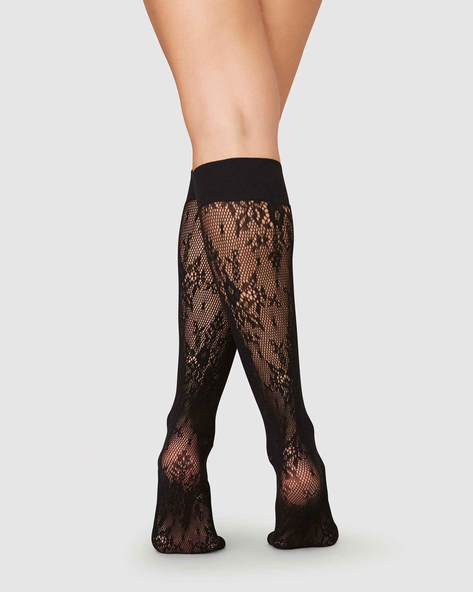Swedish Stockings Rosa Lace knee-highs in black – Available at PERSEI